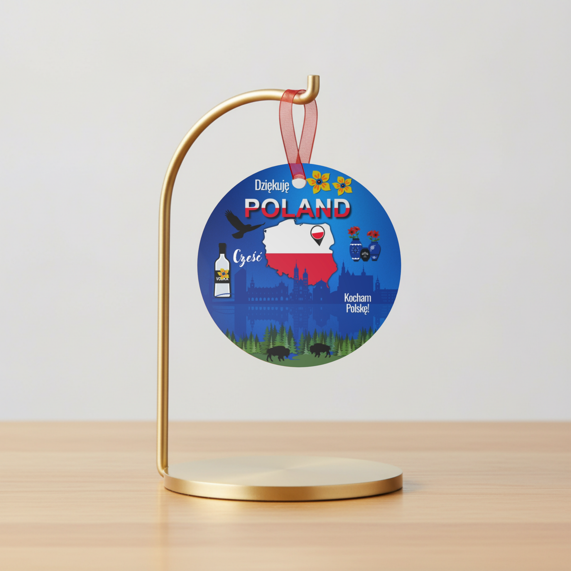 Decorative round ornament with Poland-themed design on a stand against a light gray background