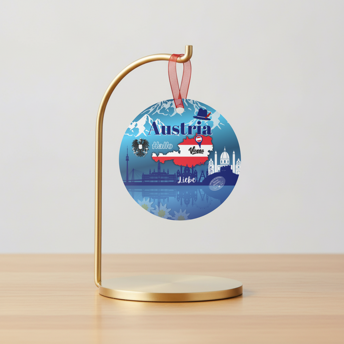 Decorative ornament with Austria design on a stand against a light gray background