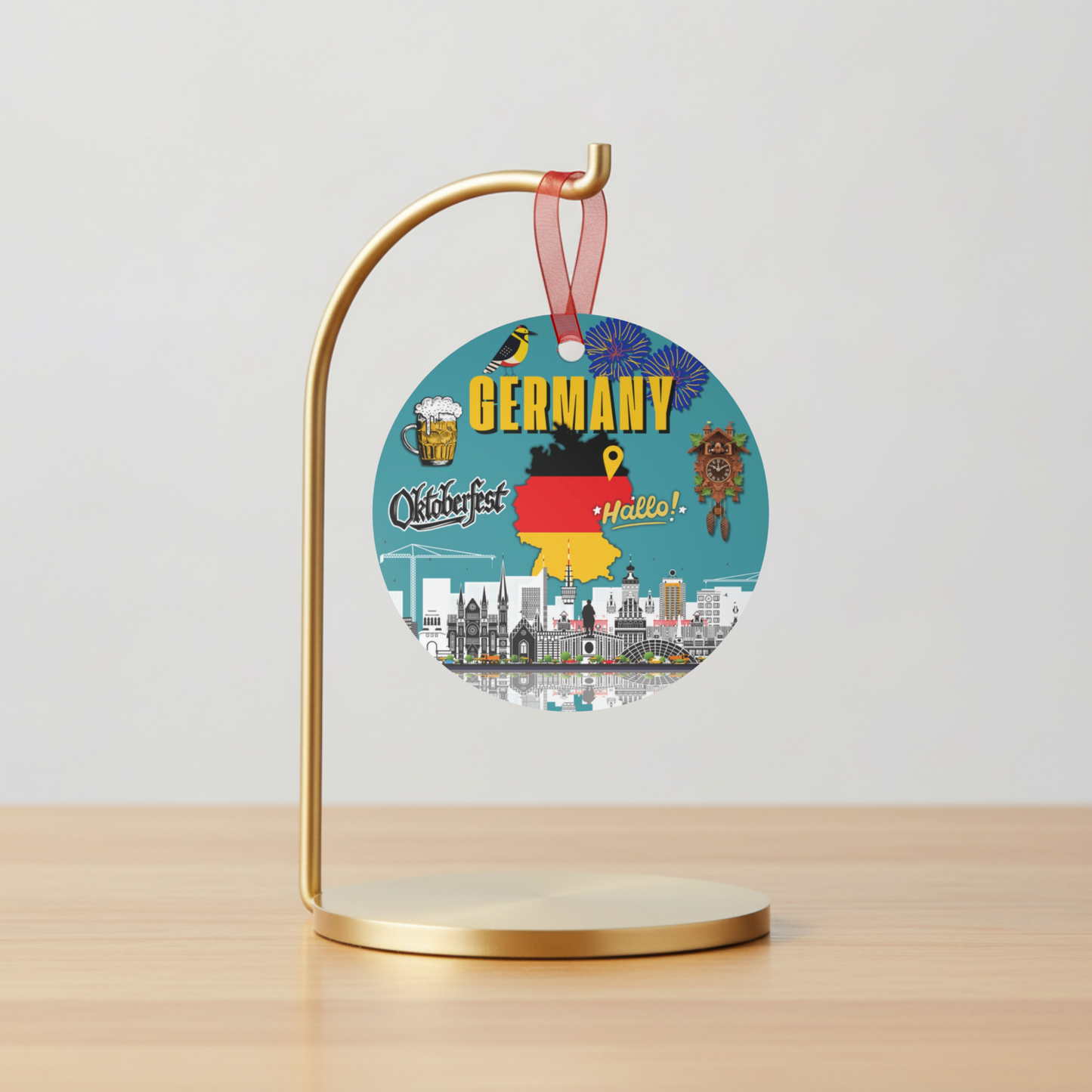 Decorative ornament with German-themed design on a stand against a light gray background