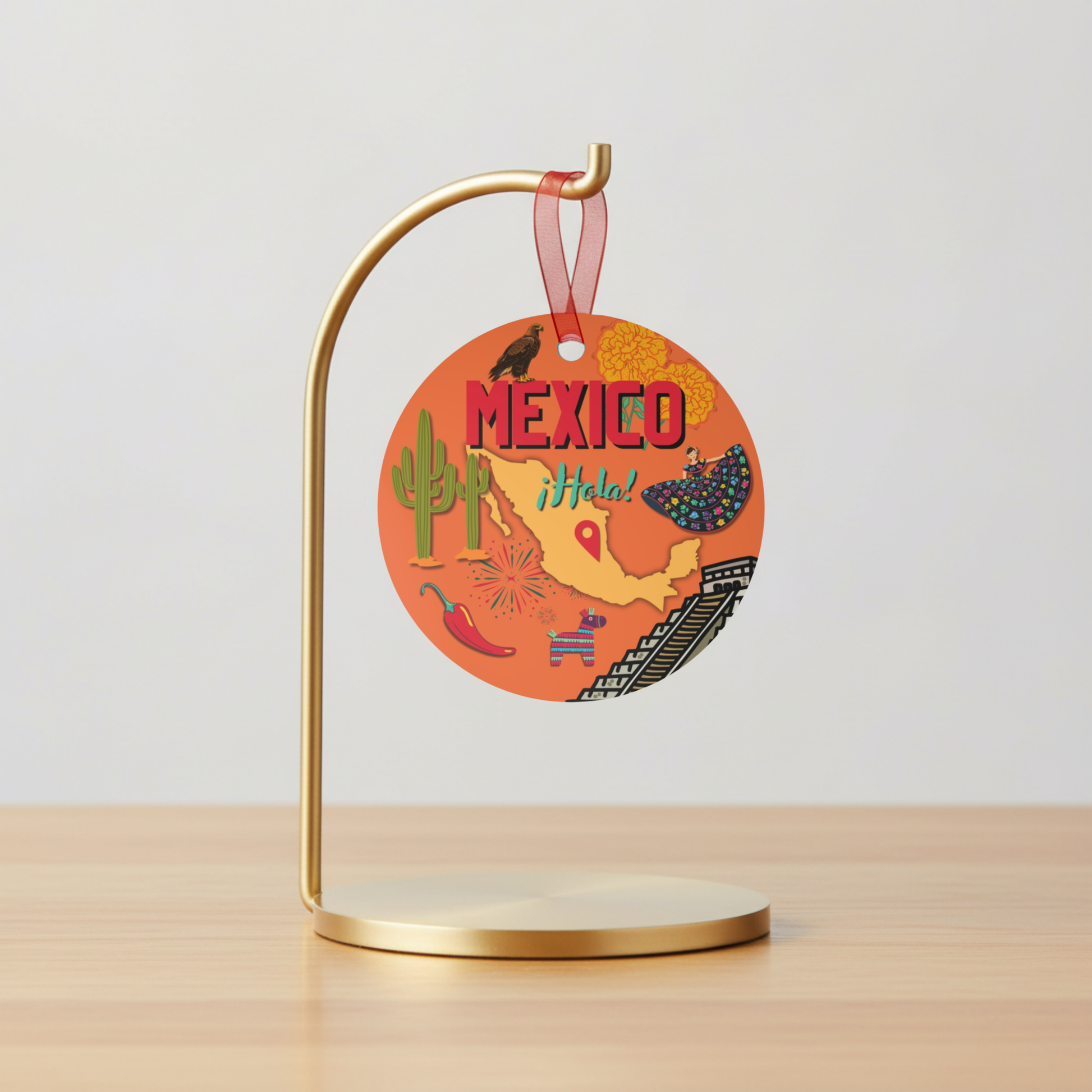 Decorative tag with 'Mexico' text and cacti design on a gold stand.