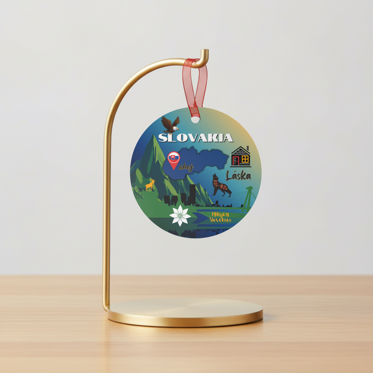 Decorative round tag with Slovakia and Laska text on a gold stand against a light gray background
