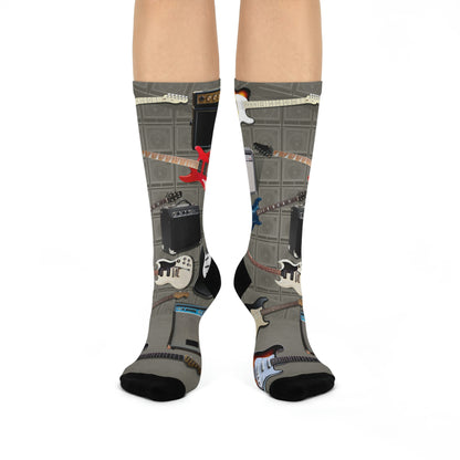 colorful arrangement of electric guitars with amps