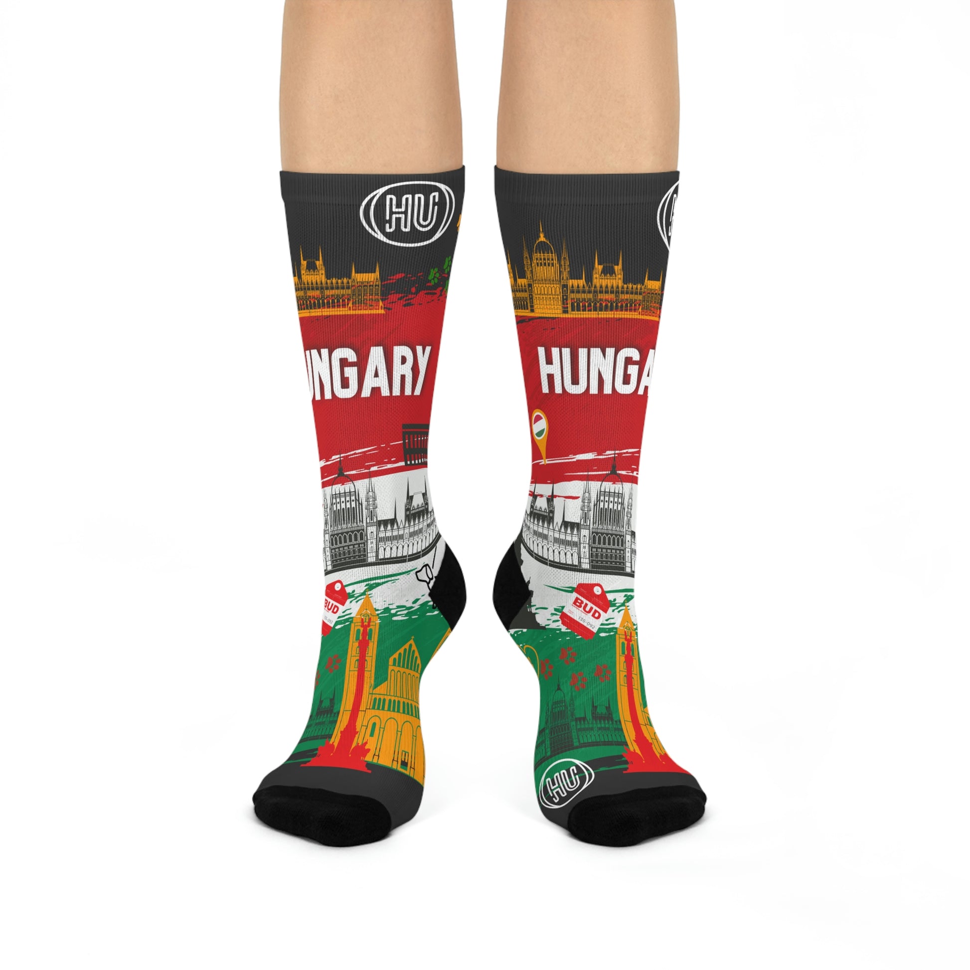 A pair of colorful socks with a Hungarian-themed design, featuring landmarks and text, intended for adults.