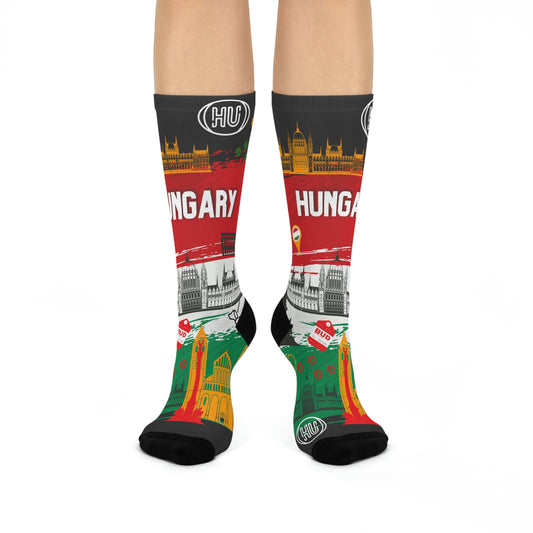 A pair of colorful socks with a Hungarian-themed design, featuring landmarks and text, intended for adults.
